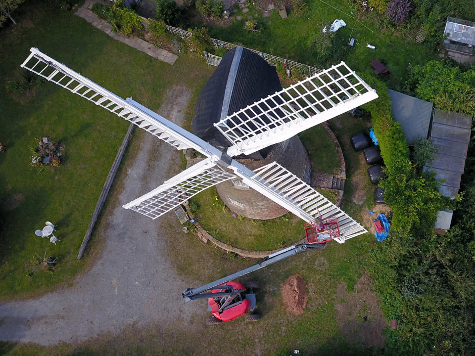 A homeowner has completed the ultimate lockdown DIY project at one of Britain's last fully-working windmills - after using a cherry picker to paint the sails by hand. Jeanette McGarry, 58, painstakingly spent three weeks touching up the paintwork on the gigantic five tonne sails as part of a refurbishment of historic Berkswell Windmill. The 70ft tall Grade II-listed building has been standing for nearly 200 years in the village of Balsall Common, West Mids., and was bought by Jeannette in 2005. She then spent £200,000 restoring the 19th century four-bladed tower mill to its former glory with the help of English Heritage after it fell into a state of disrepair.