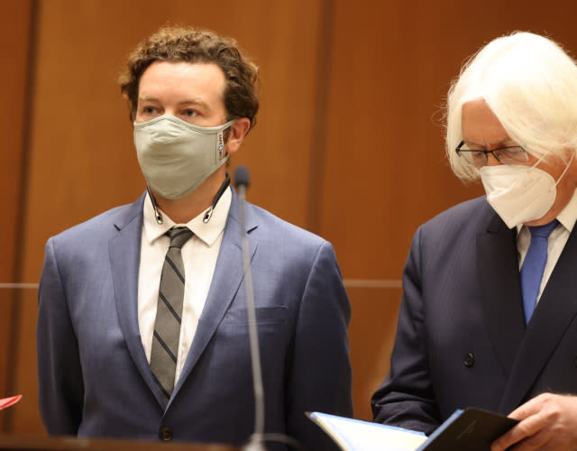 Actor Danny Masterson stands with his lawyer Thomas Mesereau as he is arraigned on three rape charges in separate incidents between 2001 and 2003, at Los Angeles Superior Court, Los Angeles, California, September 18, 2020. <em>Photo by LUCY NICHOLSON/POOL/AFP via Getty Images.</em>