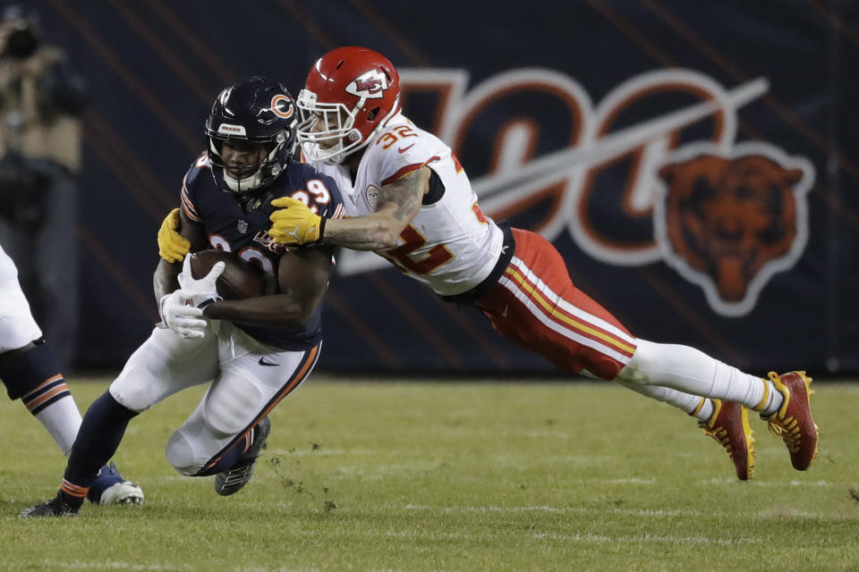 Kansas City Chiefs strong safety Tyrann Mathieu (32) tackles Chicago Bears running back Tarik Cohen (29) in the second half of an NFL football game in Chicago, Sunday, Dec. 22, 2019. (AP Photo/Nam Y. Huh)