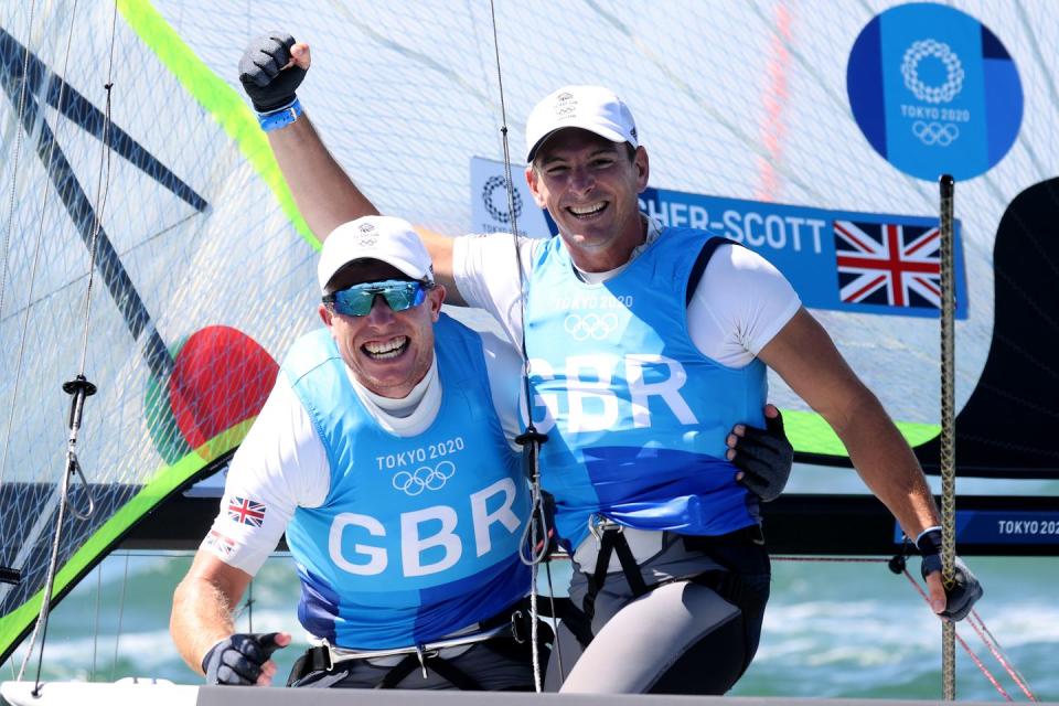 <p>Britain’s Stuart Bithell and Dylan Fletcher secured Olympic gold in the Men’s Skiff 49er, but it was a close call as they crossed the finish line just half a boat length sooner than Germany.</p>