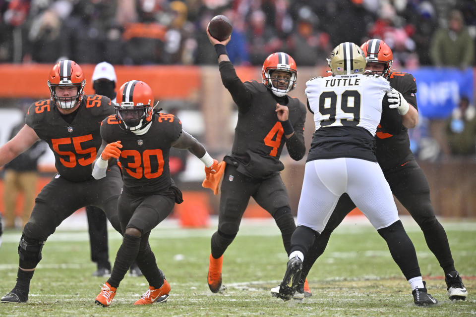 Cleveland Browns quarterback Deshaun Watson (4) throws during the first half of an NFL football game against the New Orleans Saints, Saturday, Dec. 24, 2022, in Cleveland. (AP Photo/David Richard)