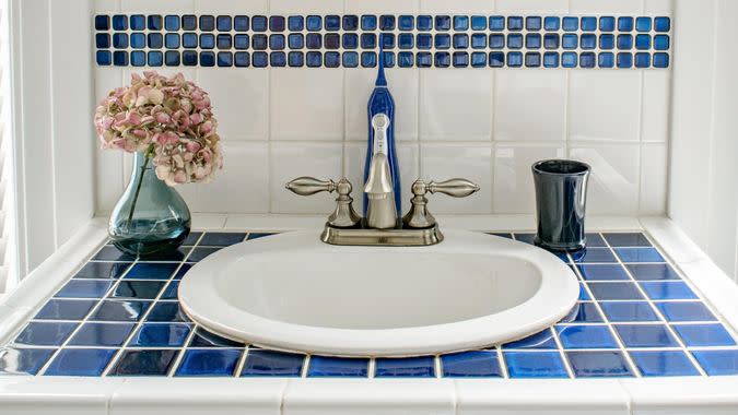 brushed nickel sink in bathroom