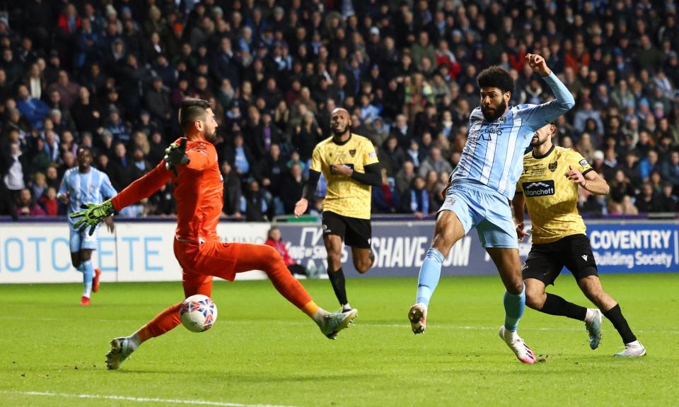 <span>Ellis Simms scores the opening goal during Coventry’s victory against Maidstone.</span><span>Photograph: Darren Staples/AFP/Getty Images</span>