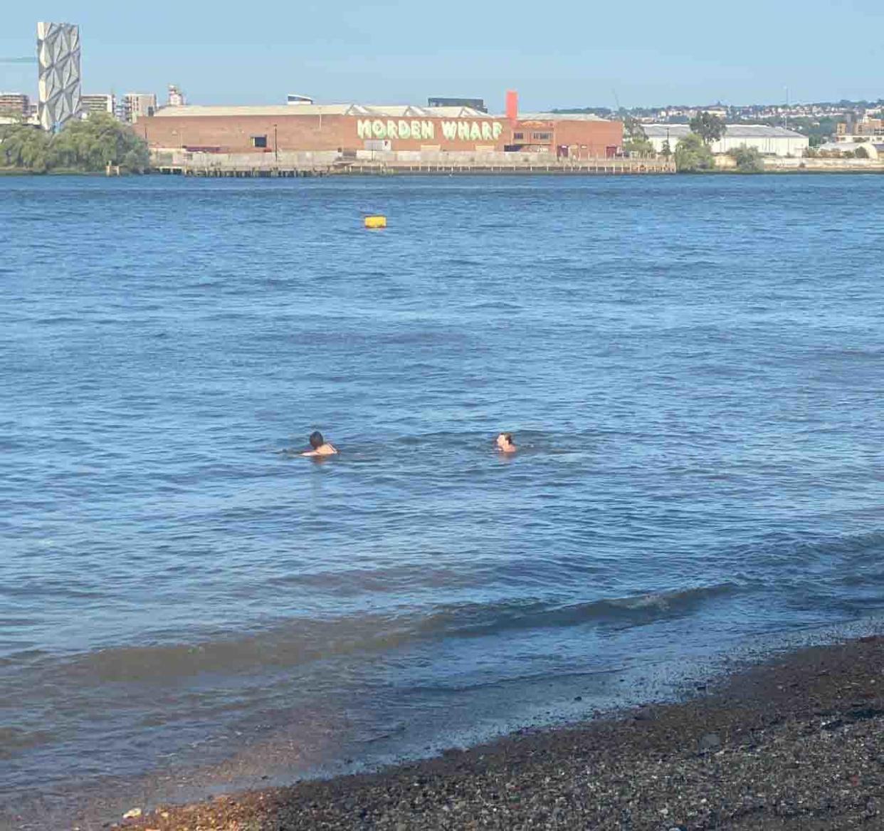 Isle of Dogs residents in London screamed at two women swimming in the Thames on Sunday, fearing for their safety. (Reach)