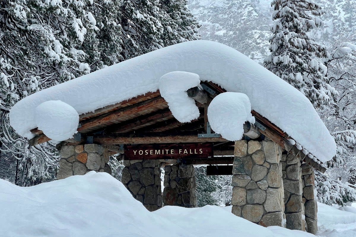 In this photo provided by the National Park Service, a structure at Yosemite Falls in Yosemite National Park, Calif., is covered in snow Tuesday, Feb. 28, 2023 (AP)