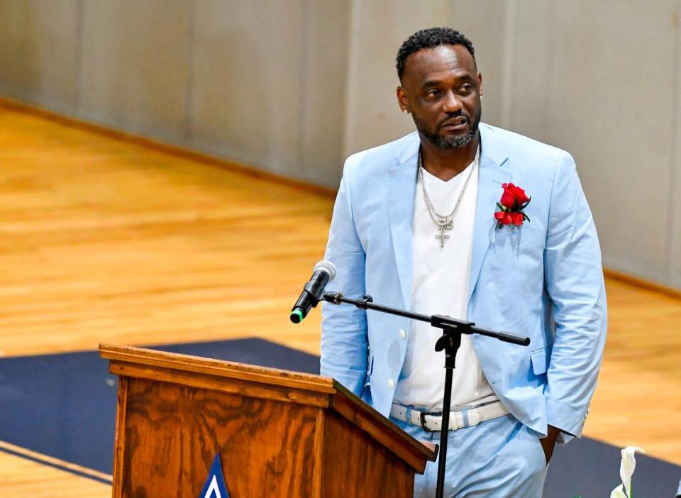 Derex Butts speaks at the funeral of his son Devin Butts Saturday inside the Stratford Academy gym to celebrate the life of former basketball player, who died May 5.