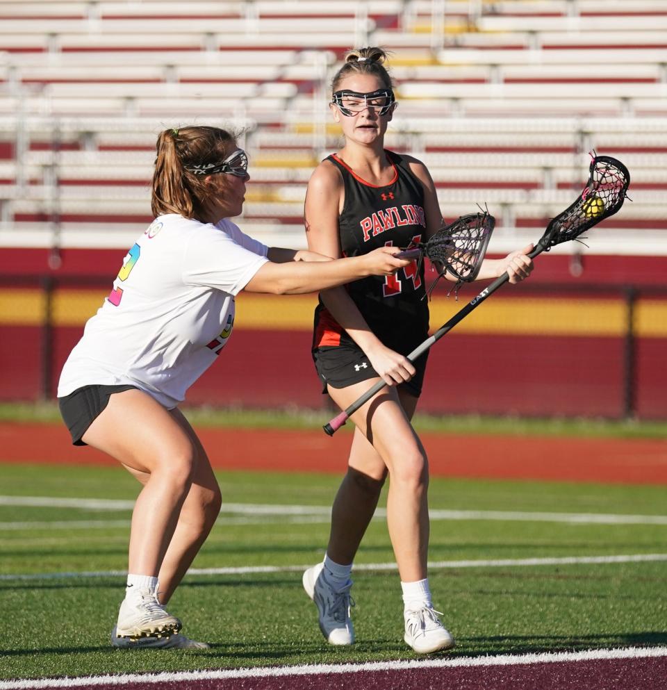 Pawling's Kelsey Wahl (14) in action during girls lacrosse action against Arlington at Arlington High School in LaGrangeville on Saturday, May 6, 2023. 