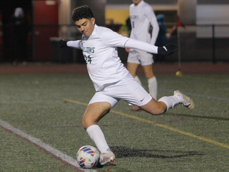 Dighton-Rehoboth's Tiago Conceicao takes a free kick during a Division 3 Final Four match against Norwell.