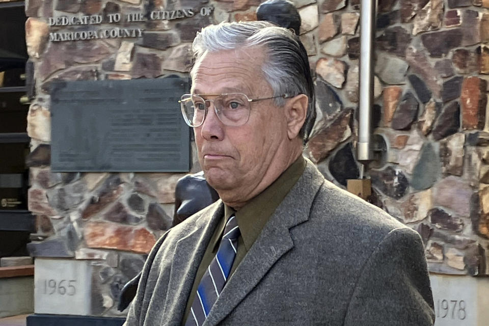 Cochise County Supervisor Tom Crosby as he leaves Maricopa County Superior Court on Thursday, Dec. 21, 2023, in Phoenix, Arizona. Crosby and Cochise County Supervisor Peggy Judd pleaded not guilty to felony charges for delaying the certification of their county’s 2022 midterm election results. The county located in southeastern Arizona ultimately certified its results after a judge ruled both Republican supervisors broke the law when they refused to sign off on the vote count by a deadline. (AP Photo/Jacques Billeaud)