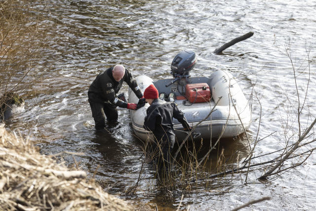 Specialist divers helped the police with the search. (SWNS)