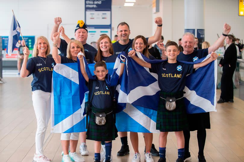 Members of Scotland player John McGinn’s family, including his aunt, uncle and cousins, at Glasgow airport heading to Munich