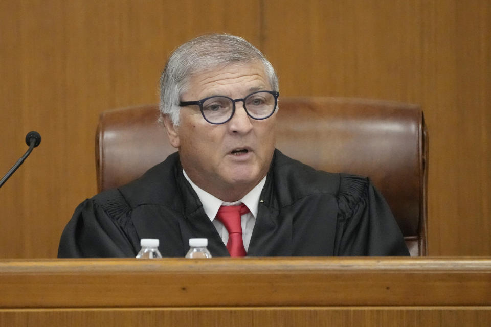 Hinds County Chancery Judge Dewayne Thomas speaks to the parties involved at a hearing, Wednesday, May 10, 2023, in Hinds County Chancery Court in Jackson, Miss., where he heard arguments about a Mississippi law that would create a court system with judges who would be appointed rather than elected. (AP Photo/Rogelio V. Solis)