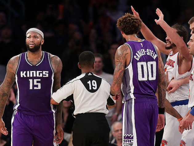 DeMarcus Cousins and Joakim Noah trade fours. (Getty Images)