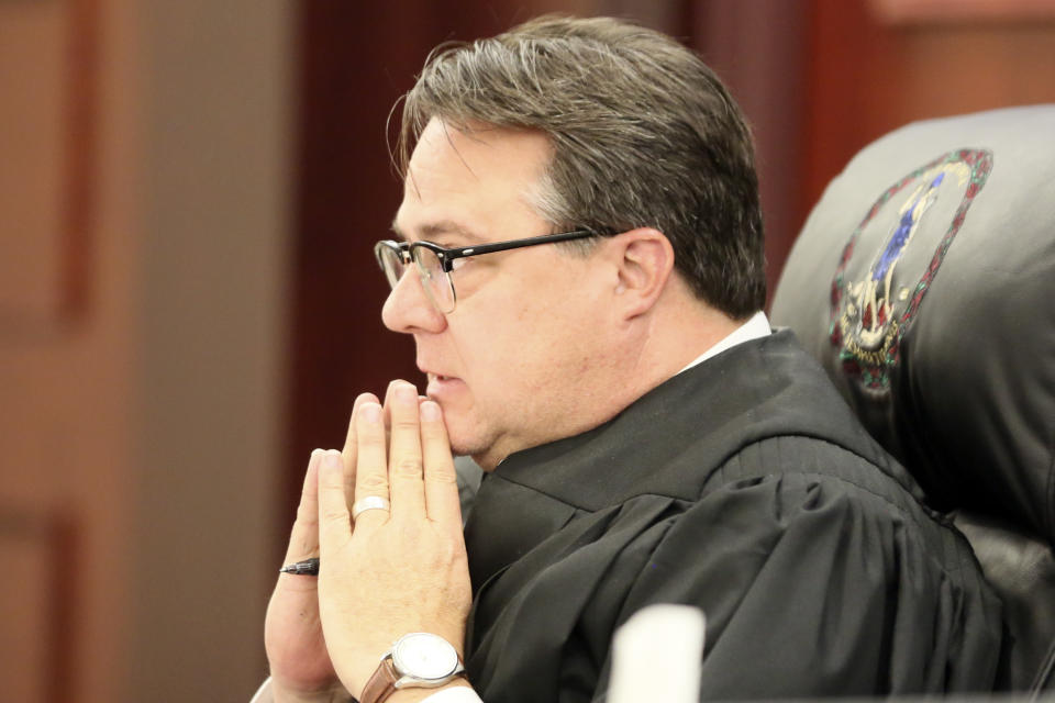 Judge Mike Fleenor presides over Isimemen Etute,'s preliminary hearing in Christiansburg Va. Thursday May 19 2022. Etute, a Virginia Tech freshman linebacker is charged in the fatal beating of a Tinder match. (Matt Gentry/The Roanoke Times via AP, Pool)