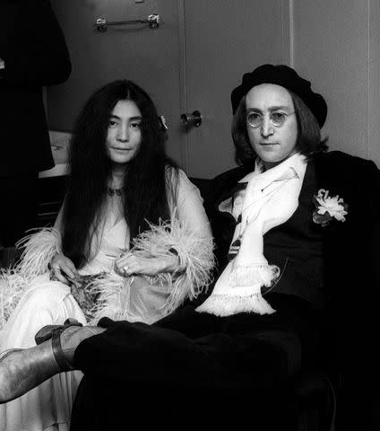 <p>Ron Galella, Ltd/Ron Galella Collection via Getty</p> John Lennon and Yoko Ono at the 1975 Grammy Awards