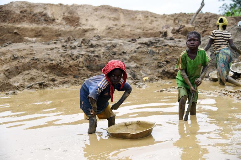 Child labour still blights many developing countries, such as the Central African Repblic, where this photo of children working at a gold mine was taken on May 5, 2014