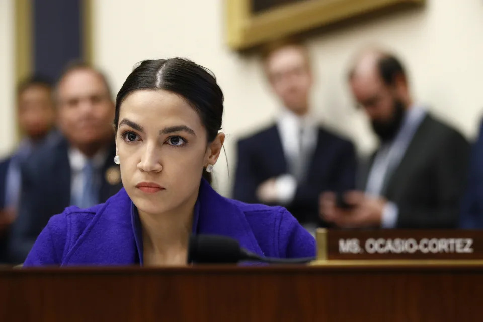 Rep. Alexandria Ocasio-Cortez, D-N.Y., listens during a House Financial Services Committee hearing with leaders of major banks, Wednesday, April 10, 2019, on Capitol Hill in Washington. (AP Photo/Patrick Semansky)