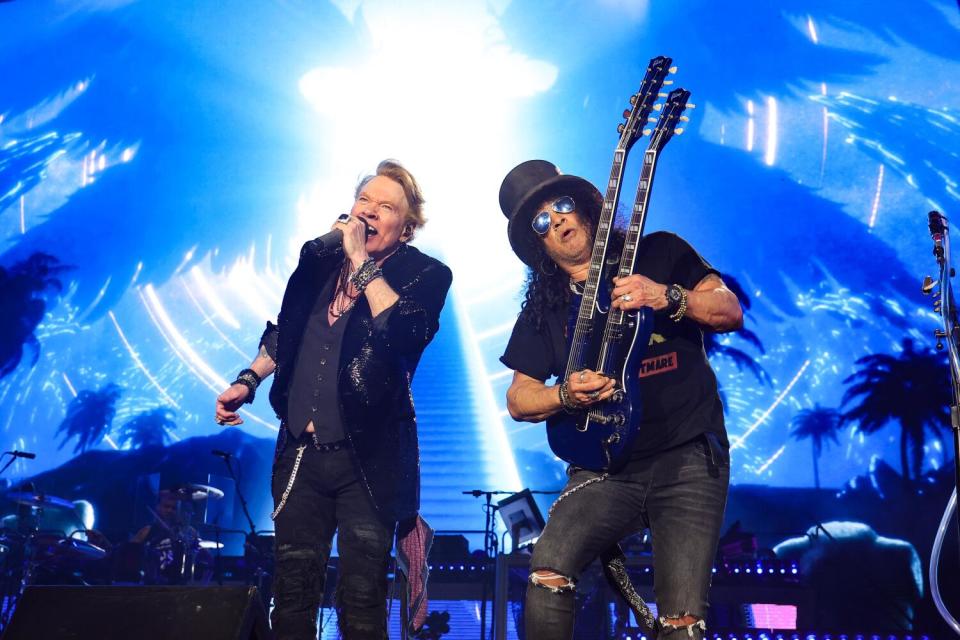 Axl Rose and Slash of Guns N' Roses perform onstage