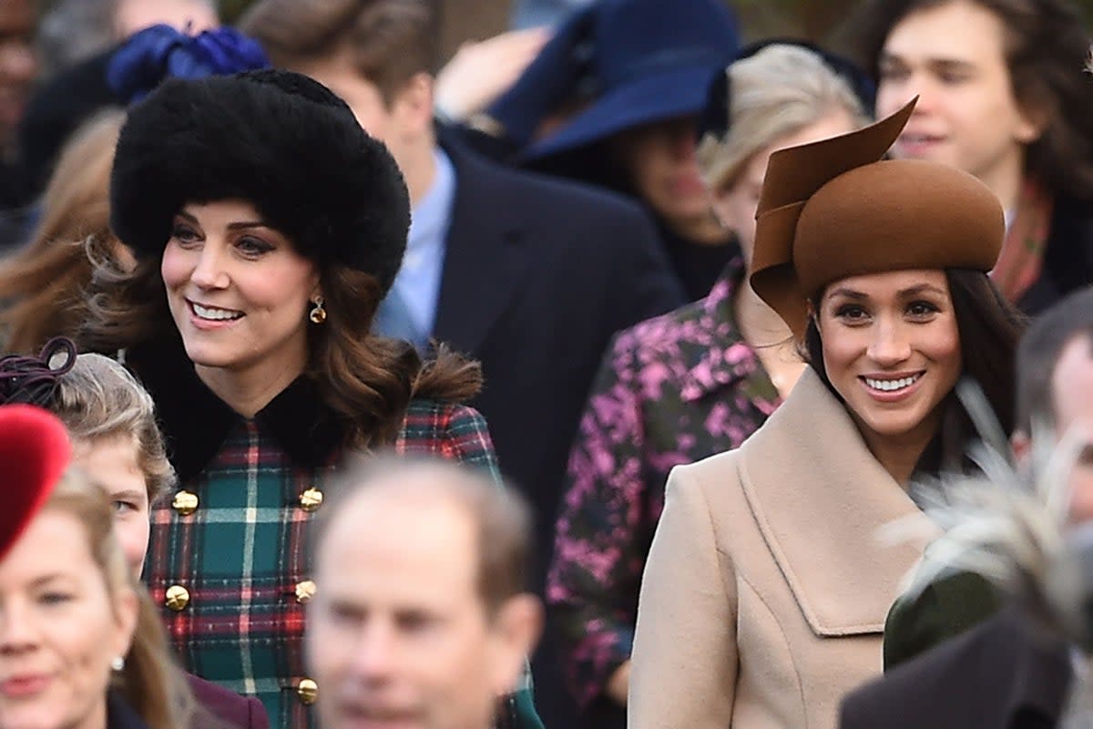 The Duchess of Cambridge (left) and Meghan Markle arriving to attend the Christmas Day morning church service at St Mary Magdalene Church in Sandringham, Norfolk, in December 2017  (PA Archive)