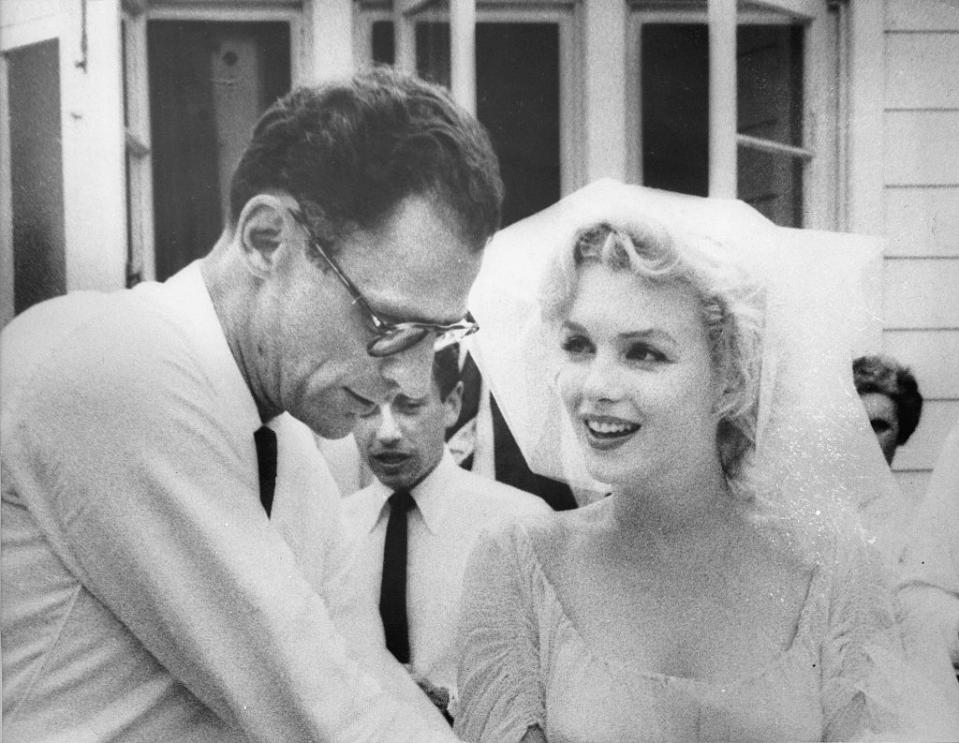 <p>Marilyn Monroe's third marriage was more traditional than her second. The Hollywood star wore a white sundress and a tulle veil when she married playwright Arthur Miller on June 29, 1956. </p>