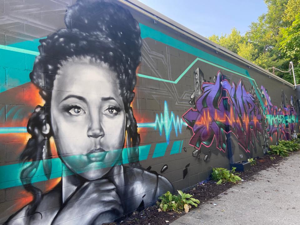 A mural on the side of Audio Labs, 2212 Ingersoll Ave., in Des Moines was created by Scarce Elementz.