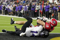 Georgia tight end Brock Bowers (19) makes a touchdown catch against TCU safety Abraham Camara (14) during the second half of the national championship NCAA College Football Playoff game, Monday, Jan. 9, 2023, in Inglewood, Calif. (AP Photo/Marcio Jose Sanchez)