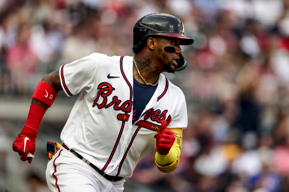 Atlanta Braves' Ronald Acuna Jr. runs to first on a double against the Los Angeles Angels during the first inning of a baseball game Saturday, July 23, 2022, in Atlanta. (AP Photo/Butch Dill)