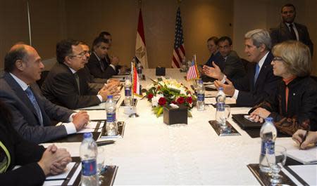U.S. Secretary of State John Kerry (2nd R) meets with Egypt's Foreign Minister Nabil Fahmy (2nd L) in Cairo November 3, 2013. REUTERS/Jason Reed