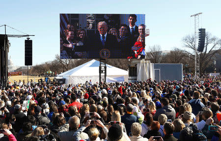 U.S. President Donald Trump, speaking from the nearby White House, addresses attendees of the March for Life rally by satellite in Washington, U.S. January 19, 2018. REUTERS/Eric Thayer