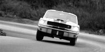 <p>This is when the Mustang became a performance-car legend. Shelby American made a few suspension and engine tweaks to the Mustang Fastback, and <a rel="nofollow noopener" href="https://www.roadandtrack.com/car-shows/detroit-auto-show/news/a24743/the-father-of-the-original-gt350r-on-building-an-icon/" target="_blank" data-ylk="slk:created a race-ready monster;elm:context_link;itc:0;sec:content-canvas" class="link ">created a race-ready monster</a>. </p><p><a rel="nofollow noopener" href="https://www.roadandtrack.com/car-culture/classic-cars/a26269/the-1965-ford-mustang-shelby-gt350-was-a-brute-back-in-the-day/" target="_blank" data-ylk="slk:Our original review;elm:context_link;itc:0;sec:content-canvas" class="link ">Our original review</a> sums it up well: "For the racing driver, it will also be a source of great amusement, as it should enable him to laugh all the way to the winner's circle in SCCA's class BP racing." Not bad for a road car.</p>