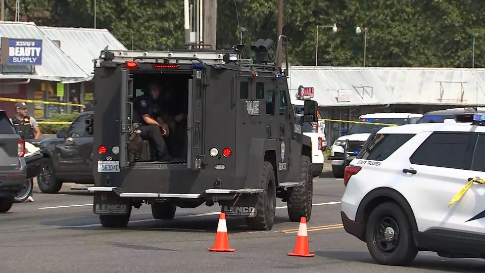 Streets were shut down in Tacoma while police searched for the suspects who shot a Tacoma Police Department detective in the shoulder on Aug. 23, 2023.