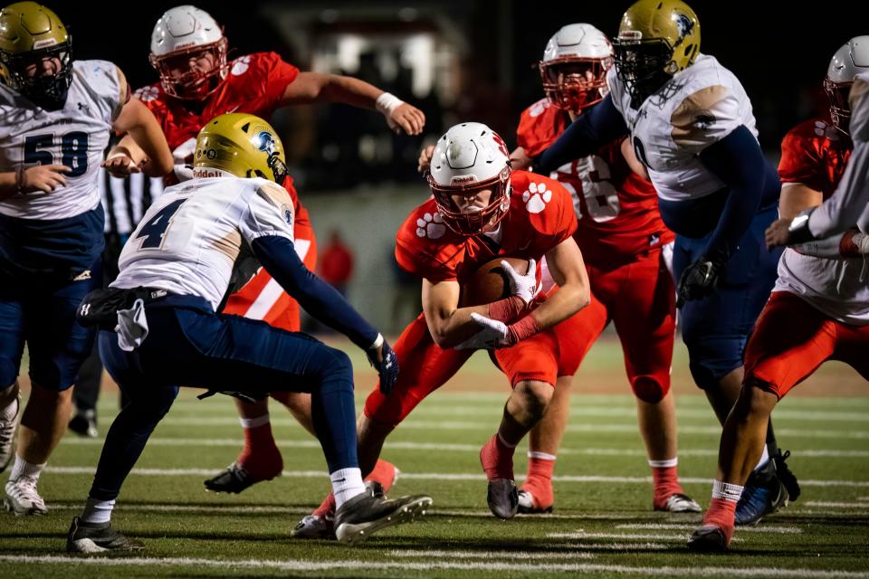 Chase Flaherty of Beechwood carries the ball in the KHSAA Class 2A state semifinal between Lloyd Memorial and Beechwood high schools Friday, Nov. 25, 2022.