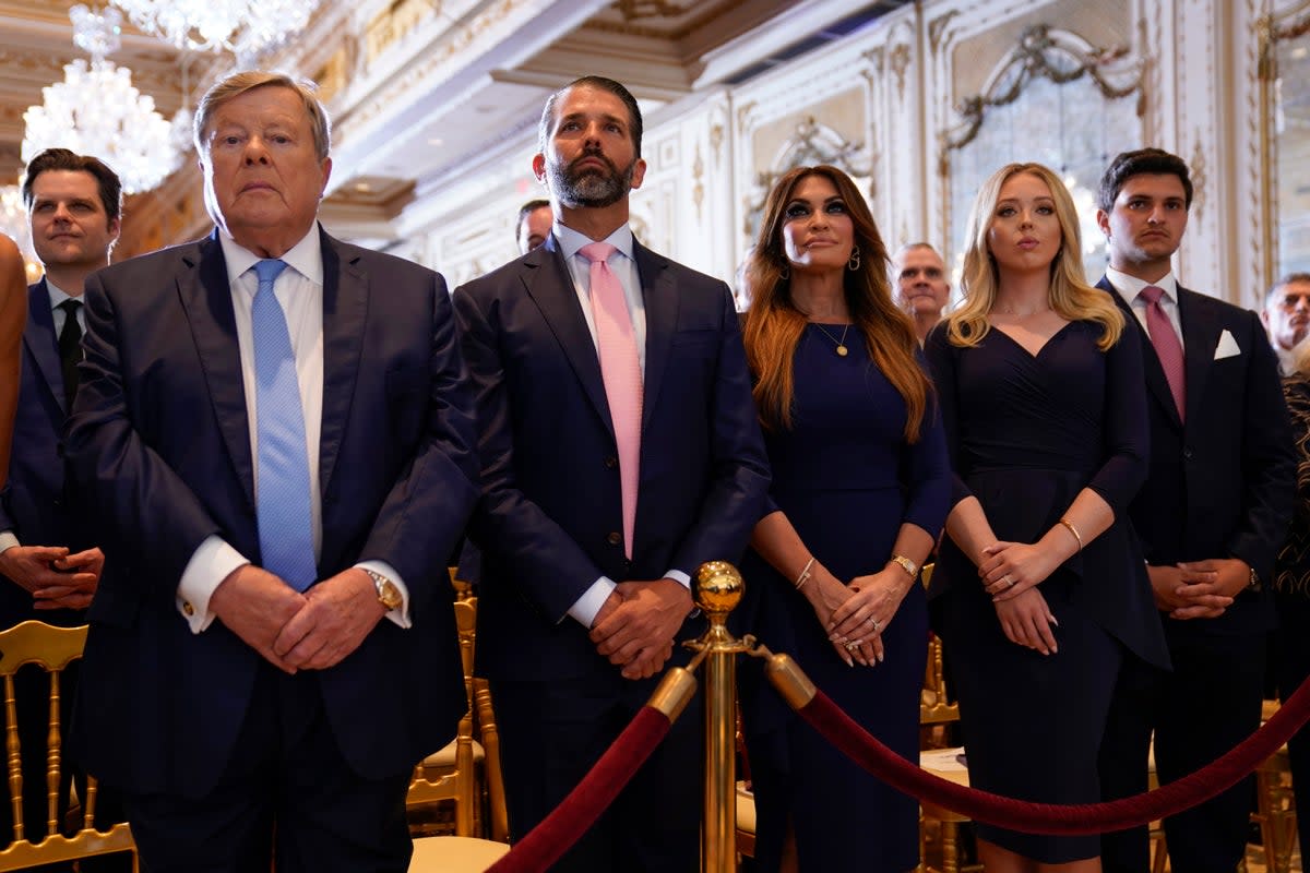 Donald Trump Jr (second left) listens to his father’s post-arraignment speech at Mar-a-Lago on Tuesday (Copyright 2023 The Associated Press. All rights reserved)