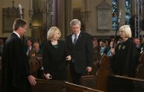 Canadian Prime Minister Stephen Harper and his wife Laureen Harper arrive for the state funeral of Canada's former finance minister Jim Flaherty in Toronto, April 16, 2014.