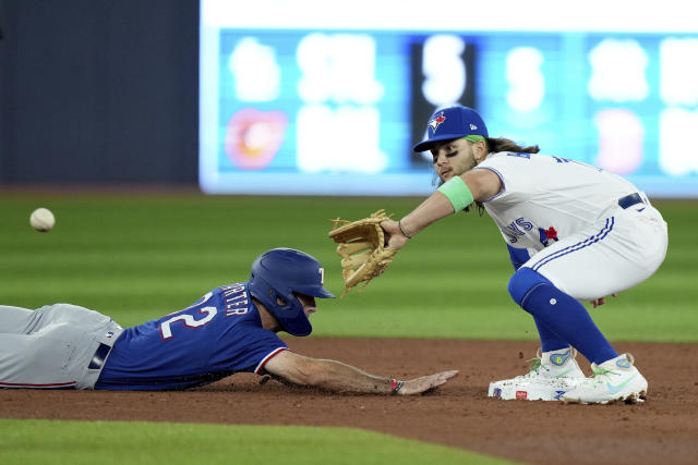 Heim, Carter help Rangers hammer Blue Jays to start crucial series