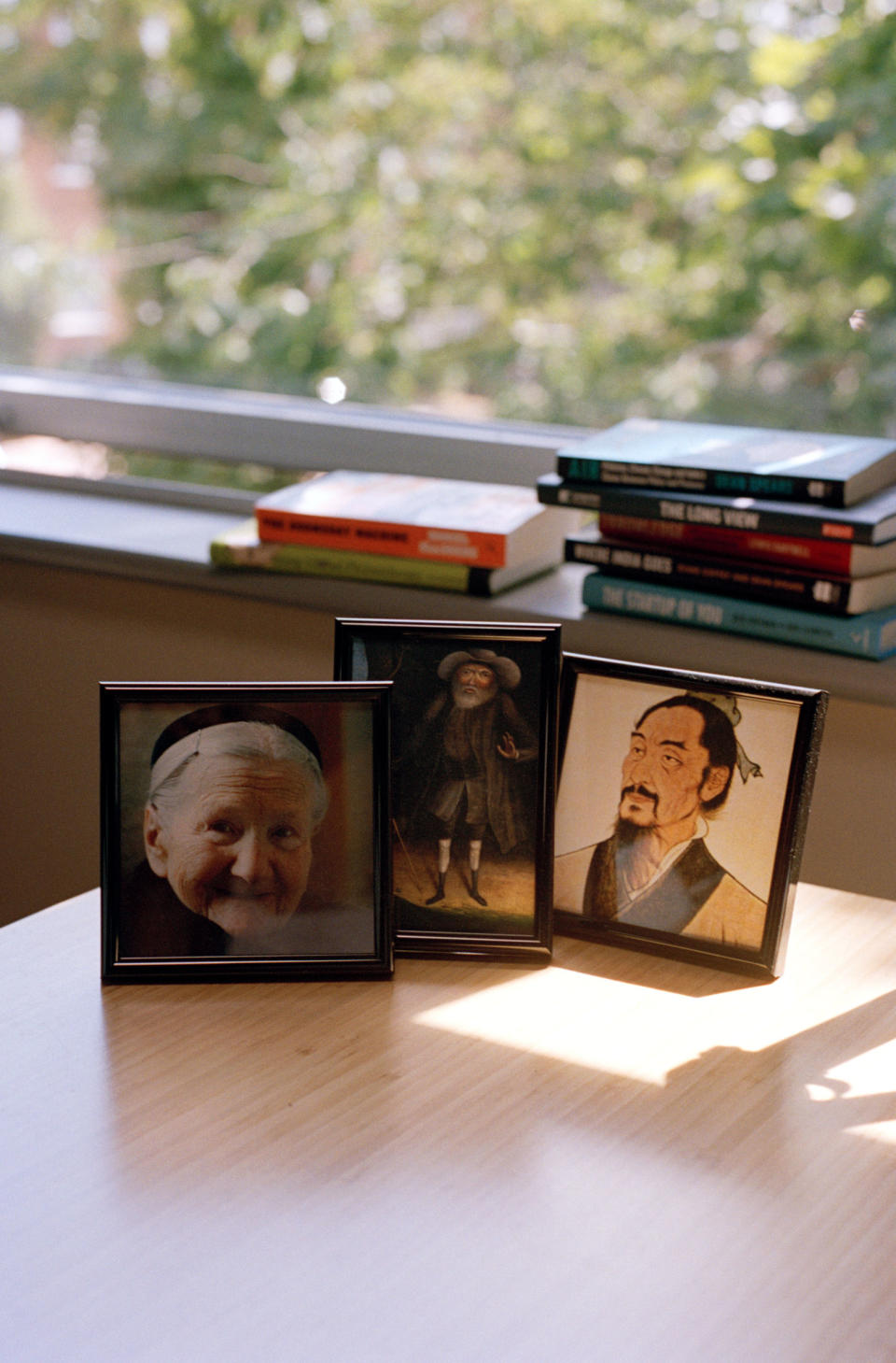 The moral pioneers on William MacAskill’s desk: humanitarian Irena Sendler, abolitionist Benjamin Lay, and philosopher Mozi<span class="copyright">Sophie Green for TIME</span>