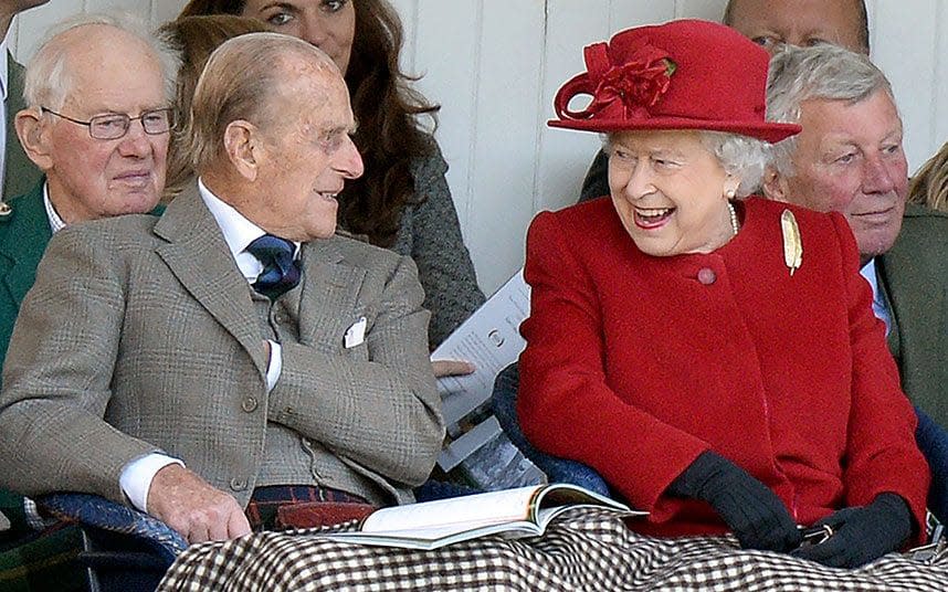 The Queen and Prince Philip laughing at the Braemar Games - Â©2015 Andrew Parsons / i-Images