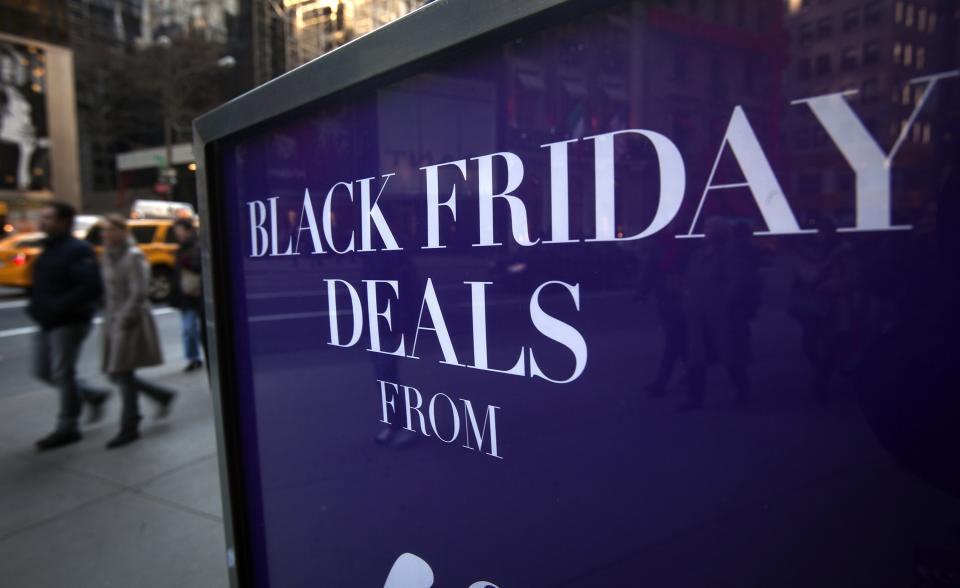 A sign along 5th Ave is pictured during Black Friday Sales in New York