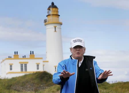 U.S. Presidential Candidate Donald Trump gestures during a visit to his Scottish golf course at Turnberry in Scotland, August 1, 2015. REUTERS/Russell Cheyne