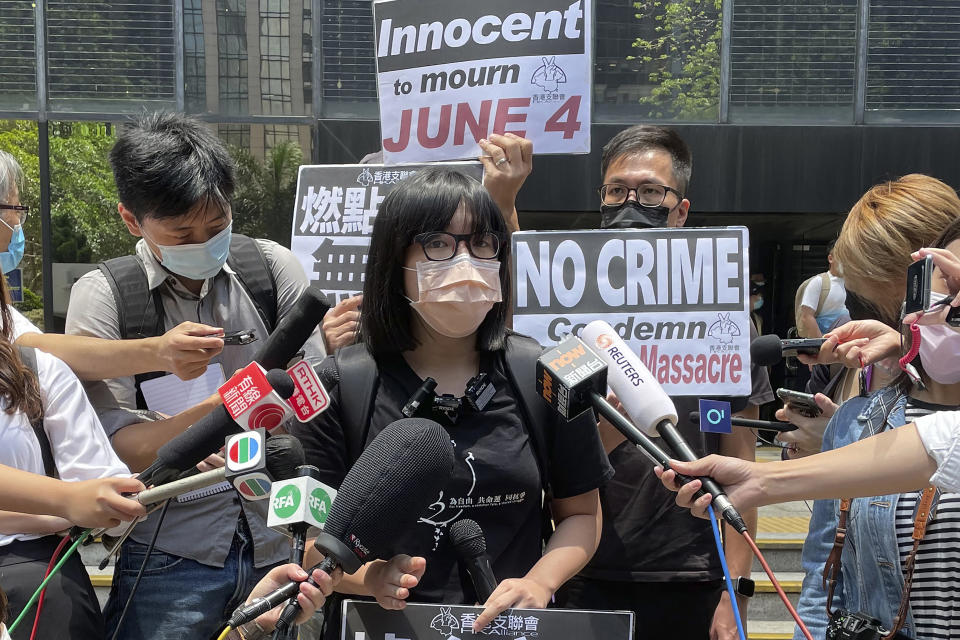 FILE - In this May 6, 2021, file photo, Chow Hang Tung, the vice chair of The Hong Kong Alliance in Support of Patriotic Democratic Movements of China, speaks to media outside a court in Hong Kong. Hong Kong police on Friday, June 4, arrested the committee member that organizes the city’s annual June 4 museum and candlelight vigil, on the 32nd anniversary of a bloody military crackdown on pro-democracy protesters in Beijing’s Tiananmen Square, according to local media reports. (AP Photo/Rafael Wober, File)