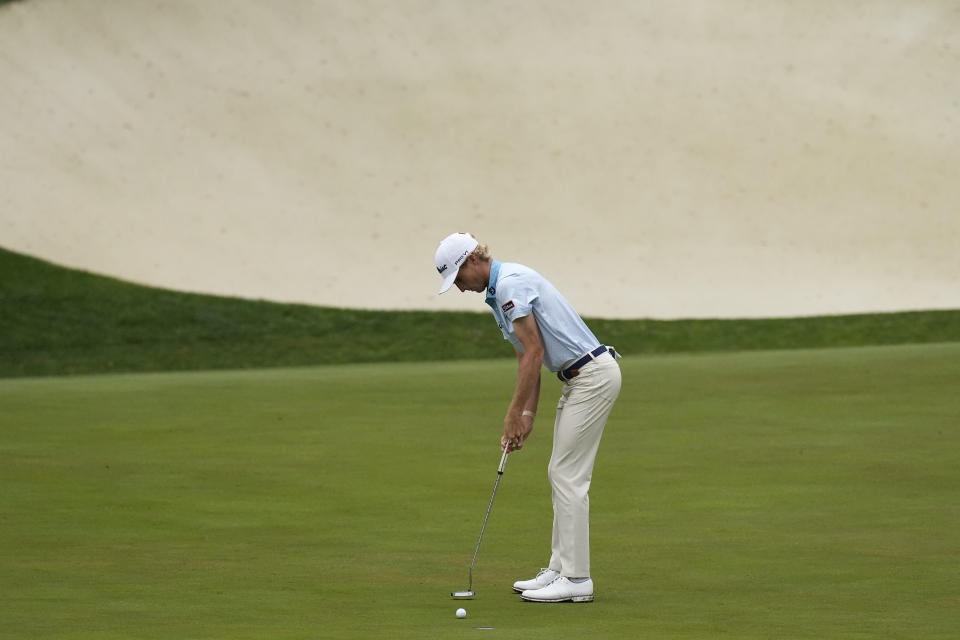 Will Zalatoris putts on the 13th hole during the third round of the Masters golf tournament on Saturday, April 10, 2021, in Augusta, Ga. (AP Photo/Gregory Bull)