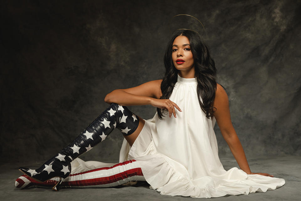 Designer and 15 Percent Pledge founder Aurora James wearing a pair of Brother Vellies boots that she custom created after the 2020 U.S. election and wore in her FN cover shoot. Dress by Azeeza. - Credit: Sage East