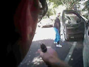 <p>Keith Scott looks over to police with hands by his sides just before he was shot four times by Charlotte police in Charlotte, N.C., in this Sept. 20, 2016 still image from video released by Charlotte police. (Charlotte-Mecklenburg Police Department/Handout via Reuters)</p>
