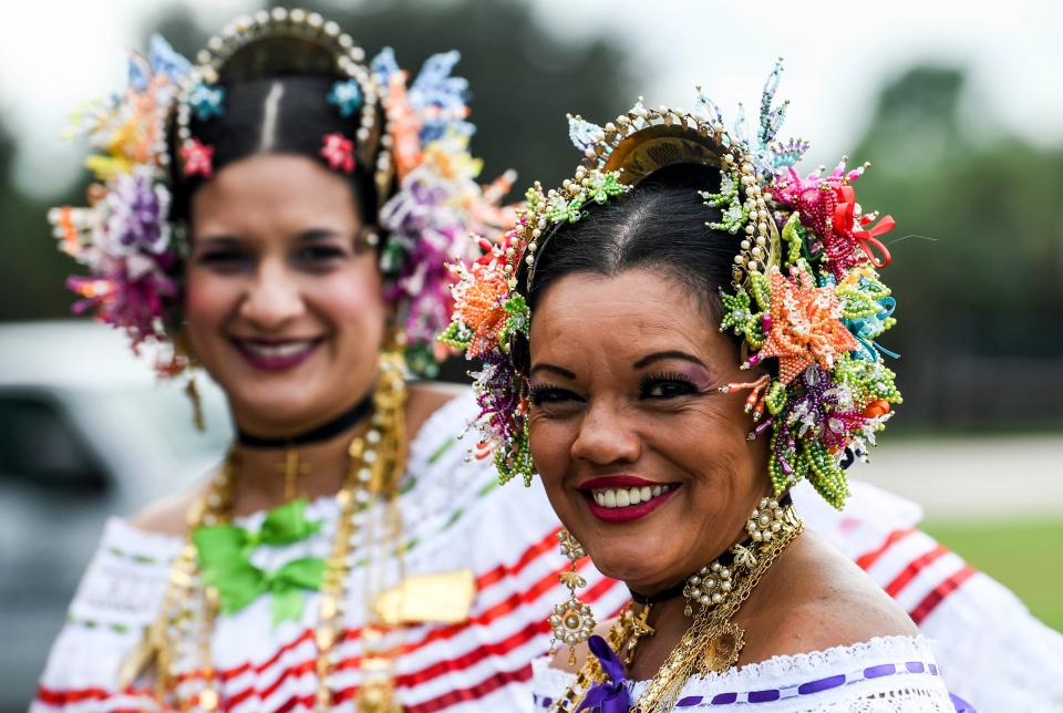 Marilyn Pinto-Mertz and Dora Vizcaino smile for the camera in their Panamanian costumes during the Viva Brevard Festival at Fred Poppe Regional Park in Palm Bay. Craig Bailey/FLORIDA TODAY via USA TODAY NETWORK