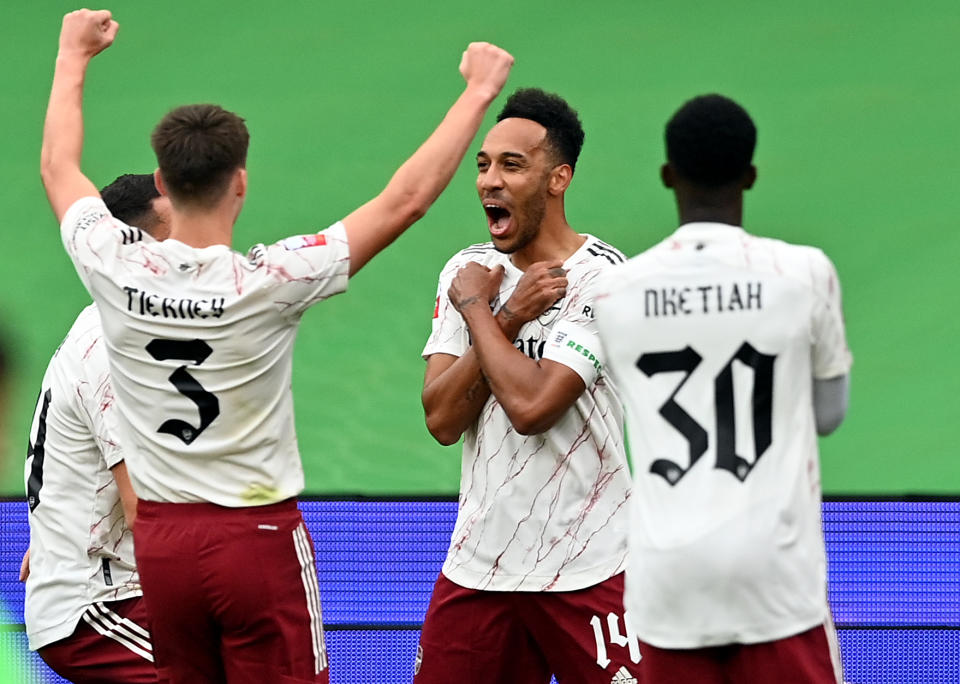 Arsenals Pierre-Emerick Aubameyang celebrates scoring his side's first goal of the game by doing a Wakanda Forever salute in tribute to actor Chadwick Boseman.