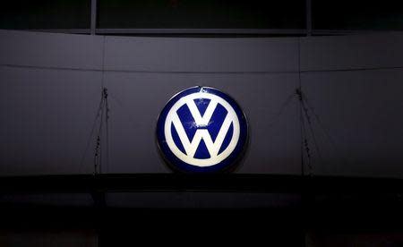 A logo of Volkswagen is illuminated at a dealership in Seoul, South Korea, November 25, 2015. REUTERS/Kim Hong-Ji