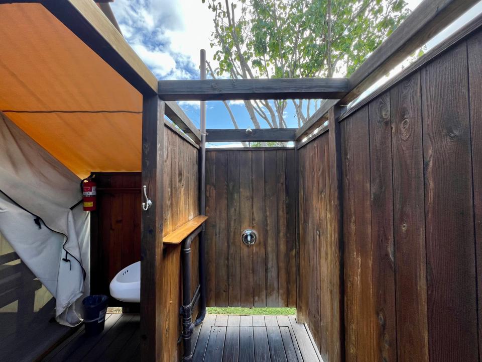 wooden outdoor shower booth