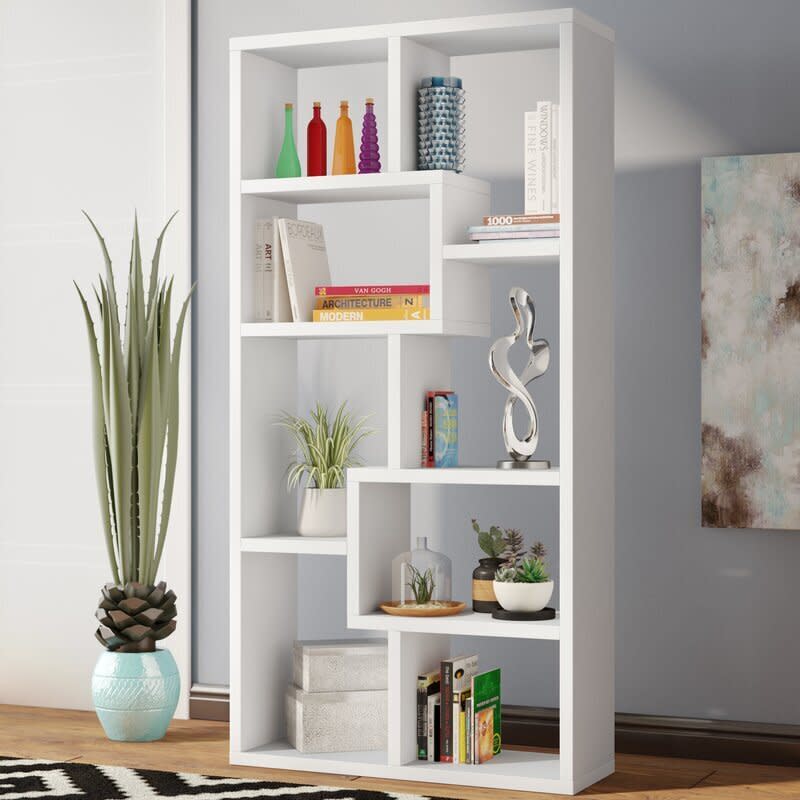 All her favorite books, all in one place in this practical book case&nbsp;<a href="https://fave.co/3a9UVhU" target="_blank" rel="noopener noreferrer"><strong>from Wayfair</strong></a>. If she's an avid reader, she might appreciate a <strong><a href="https://www.huffpost.com/entry/top-january-2020-book-releases_l_5e161127c5b66361cb5e740b" target="_blank" rel="noopener noreferrer">hot new release to thumb through</a></strong> instead.&nbsp;