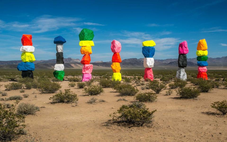 <p><strong>Seven Magic Mountains</strong></p><p>An Instagrammer’s dream, the <a href="http://sevenmagicmountains.com/" rel="nofollow noopener" target="_blank" data-ylk="slk:Seven Magic Mountains;elm:context_link;itc:0;sec:content-canvas" class="link ">Seven Magic Mountains</a> located a short drive outside of <a href="https://www.visitlasvegas.com/" rel="nofollow noopener" target="_blank" data-ylk="slk:Las Vegas;elm:context_link;itc:0;sec:content-canvas" class="link ">Las Vegas</a> is magical photo op. This installation of seven colorful and vibrant stacked “mountains” is by Swiss artist Ugo Rondinone. Visit sooner than later as the exhibit will be taken down at the end of 2021.</p>