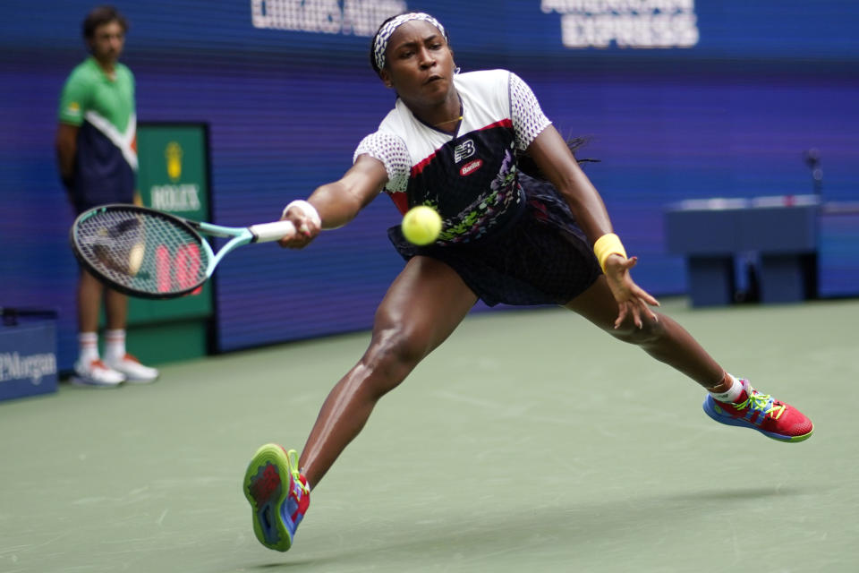 Coco Gauff, of the United States, returns against Shuai Zhang, of China, during the fourth round of the U.S. Open tennis championships, Sunday, Sept. 4, 2022, in New York. (AP Photo/Eduardo Munoz Alvarez)